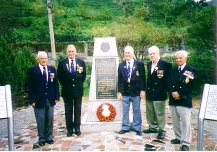 Royal Navy crewmembers pay tribute to the POWs at the Kinkaseki Camp Memorial